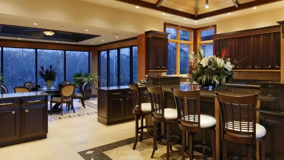 Bright kitchen with large windows treated with window film